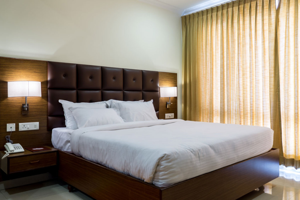 Suite bedroom at Hotel Saptagiri